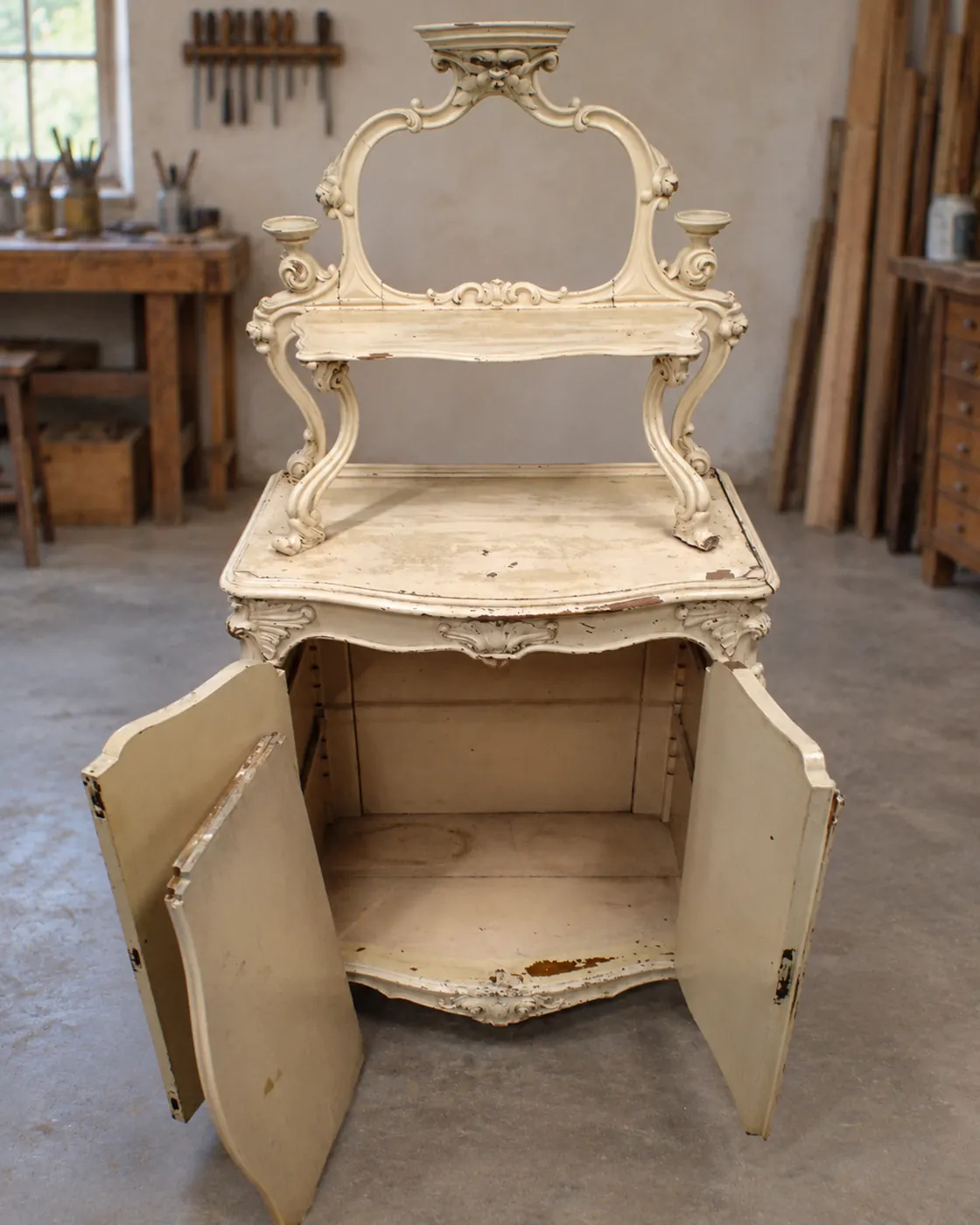 Rococo revival mirror-back étagère painted over in cream oil paint, doors open and shelves missing